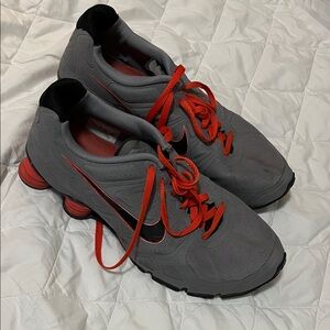 Nike Men's Athletic Shoes in Gray with Red Accents